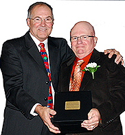 Brian Tremblay presents Boys & Girls Club Hall of Fame award to Bob Molloy