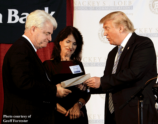 Donald Trump presents John and Diane Foley with a donation to the James. W. Foley Legacy Fund, which they founded in honor of their son, James, posthumous recipient of the First Amendment Award at the Nackey S. Loeb School of Communications First Amendment event 
              on November 12, 2014.