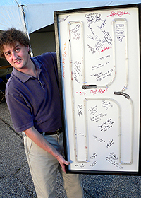 Gary Archambeault with the WKBR Big K sign